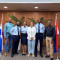 Minister Tackling Swears in Three Customs Officers.